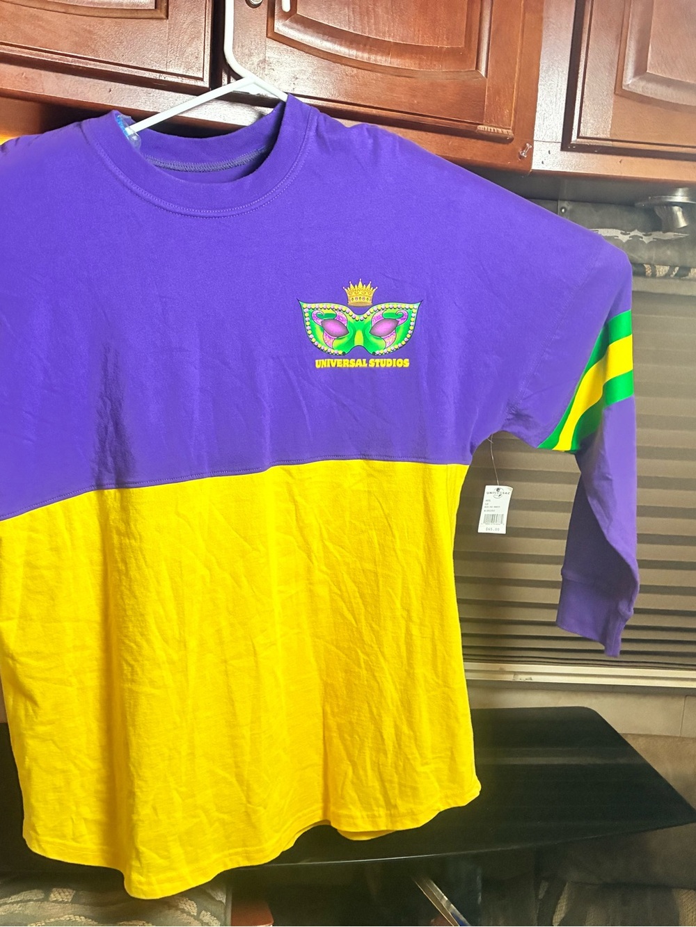 Universal Purple and Yellow Long-Sleeve Tee with Mask Emblem